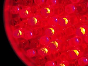 Infrared Light Therapy - Showing little red lights that enhance blood flow through the body