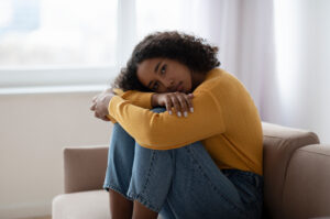Young women suffering from PTSD and depression.
