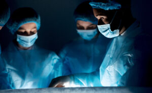 Surgeons preforming surgery in an operation room